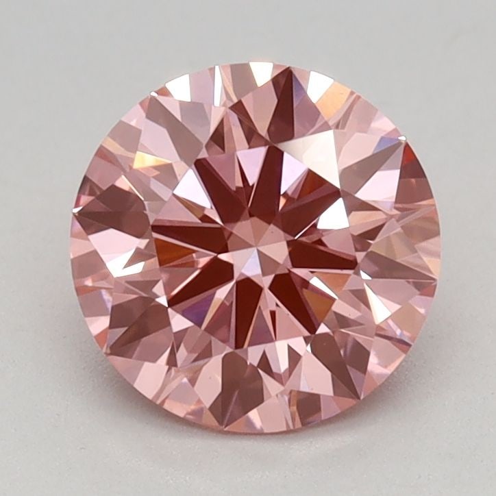 Ideal Loose Diamond - ROUND 0.96ct Fancy Vivid Pink VS1: Ideal Loose Diamond - ROUND 0.96ct Fancy Vivid Pink VS1 Source: This is a real non-mined Diamond that has been grown in a lab Shape: ROUND Carats: 0.96 Color: Fancy Vivid Pink Certification: IGI Video