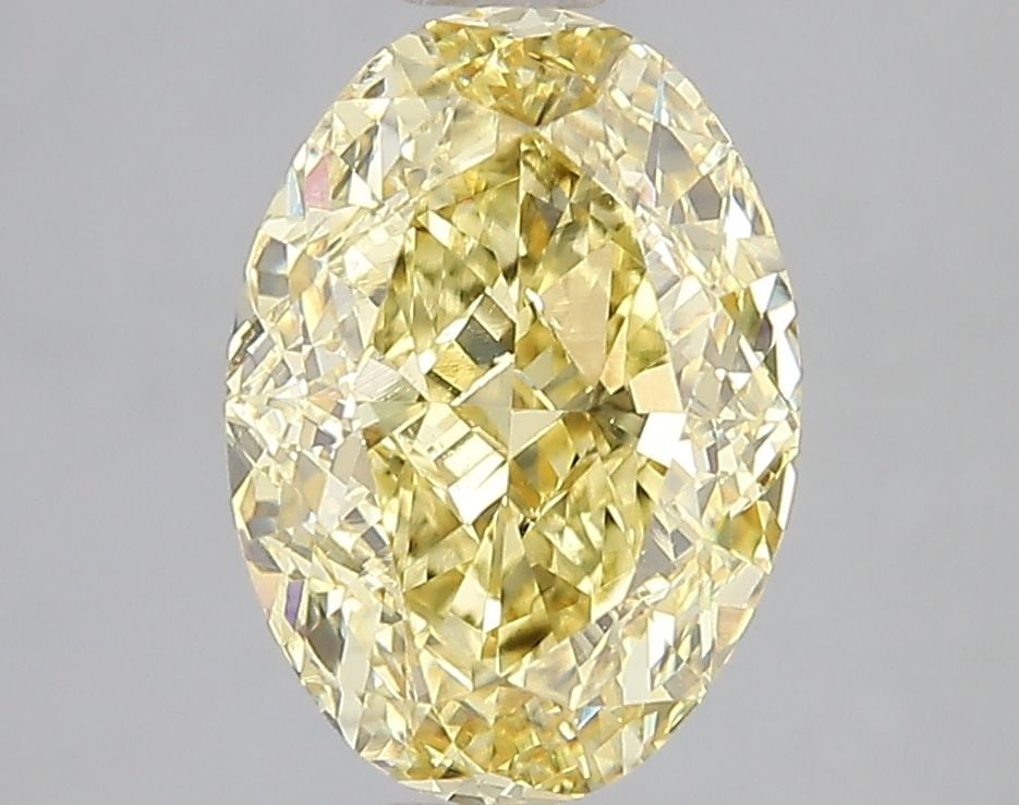 Loose Diamond - OVAL 3.03ct Fancy Vivid Yellow VS2: Loose Diamond - OVAL 3.03ct Fancy Vivid Yellow VS2 Source: This is a real non-mined Diamond that has been grown in a lab Shape: OVAL Carats: 3.03 Color: Fancy Vivid Yellow Certification: IGI Video: