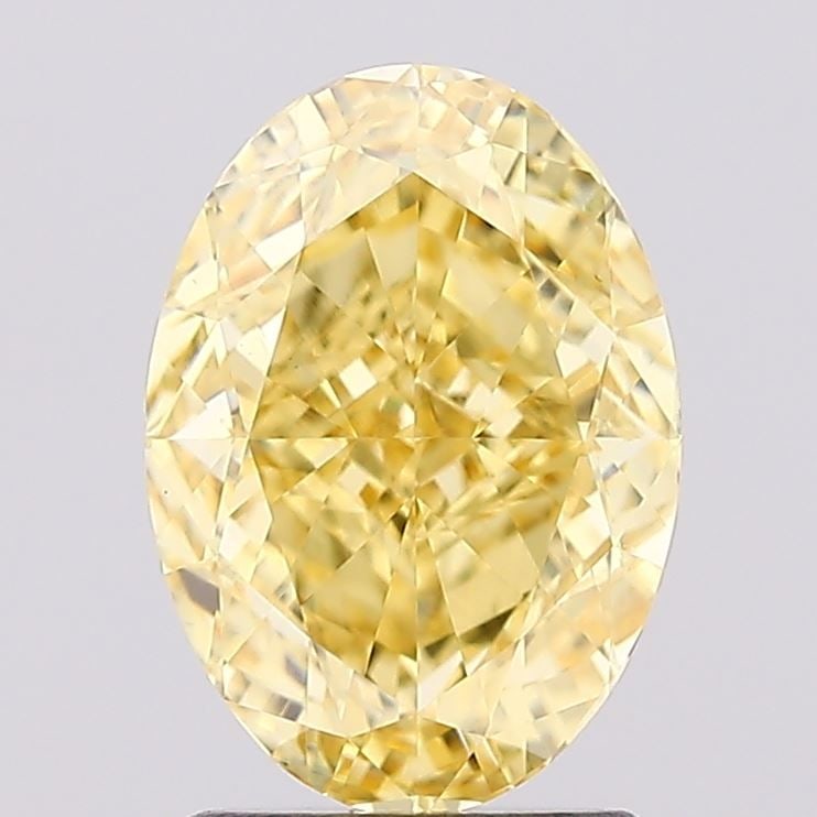 Loose Diamond - OVAL 2.15ct Fancy Vivid Yellow VS1: Loose Diamond - OVAL 2.15ct Fancy Vivid Yellow VS1 Source: This is a real non-mined Diamond that has been grown in a lab Shape: OVAL Carats: 2.15 Color: Fancy Vivid Yellow Certification: IGI Video: