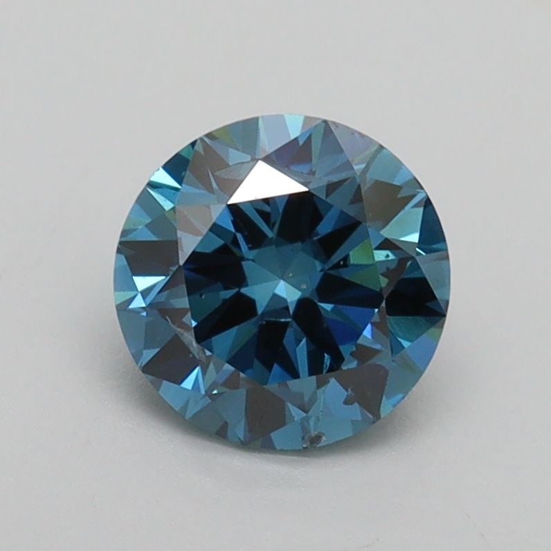 Loose Diamond - ROUND 0.99ct Fancy Vivid Blue SI2: Loose Diamond - ROUND 0.99ct Fancy Vivid Blue SI2 Source: This is a real non-mined Diamond that has been grown in a lab Shape: ROUND Carats: 0.99 Color: Fancy Vivid Blue Certification: IGI Video: