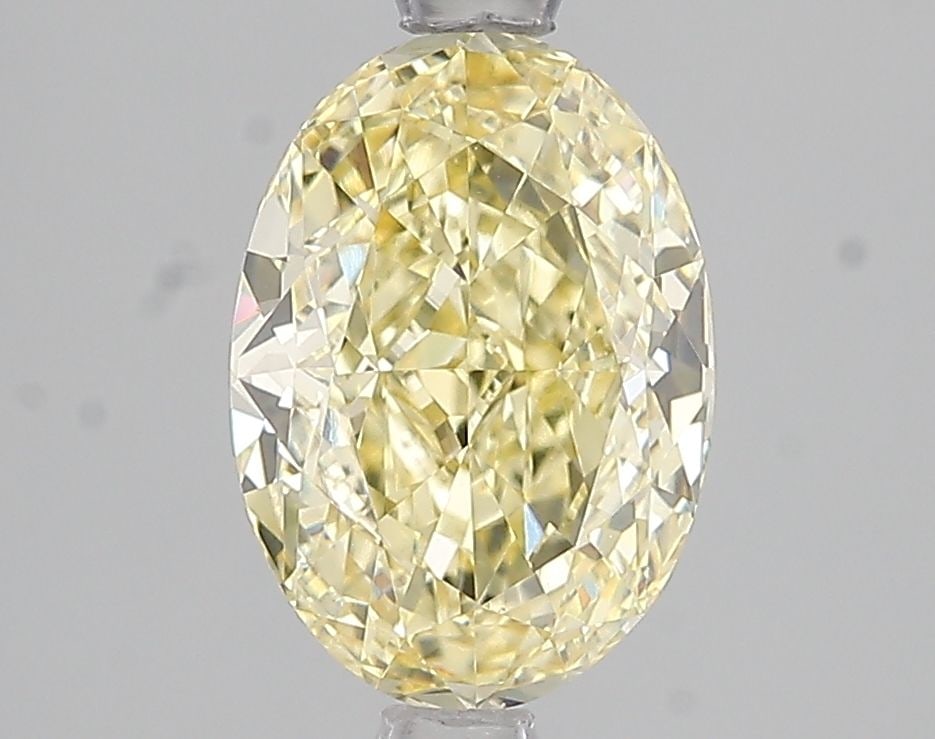 Loose Diamond - OVAL 2.12ct Fancy Intense Yellow VVS2: Loose Diamond - OVAL 2.12ct Fancy Intense Yellow VVS2 Source: This is a real non-mined Diamond that has been grown in a lab Shape: OVAL Carats: 2.12 Color: Fancy Intense Yellow Certification: IGI Vide