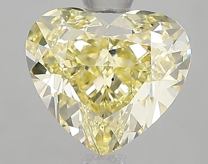 Loose Diamond - HEART 2.01ct Fancy Yellow VS2: Loose Diamond - HEART 2.01ct Fancy Yellow VS2 Source: This is a real non-mined Diamond that has been grown in a lab Shape: HEART Carats: 2.01 Color: Fancy Yellow Certification: IGI Video: