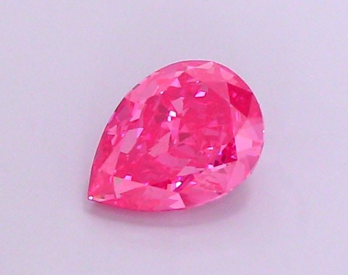 Loose Diamond - PEAR 1.21ct Fancy Vivid Pink VS1: Loose Diamond - PEAR 1.21ct Fancy Vivid Pink VS1 Source: This is a real non-mined Diamond that has been grown in a lab Shape: PEAR Carats: 1.21 Color: Fancy Vivid Pink Certification: IGI Video:
