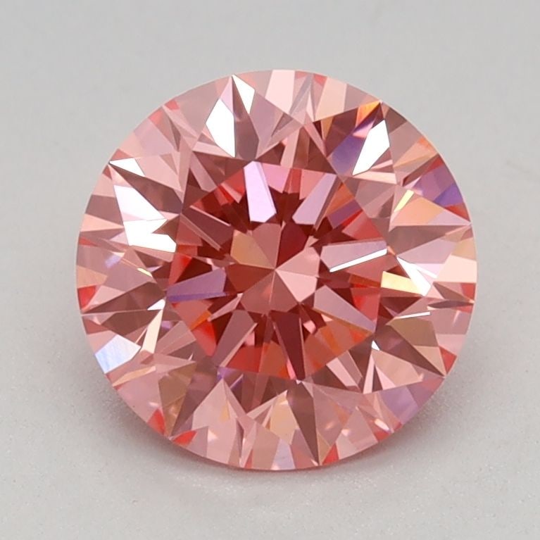 Ideal Loose Diamond - ROUND 1.14ct Fancy Vivid Pink VVS2: Ideal Loose Diamond - ROUND 1.14ct Fancy Vivid Pink VVS2 Source: This is a real non-mined Diamond that has been grown in a lab Shape: ROUND Carats: 1.14 Color: Fancy Vivid Pink Certification: IGI Vide