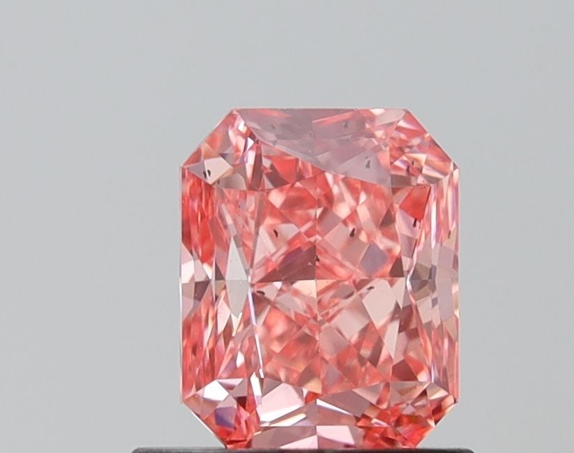 Loose Diamond - RADIANT 1.01ct Fancy Vivid Pink SI1: Loose Diamond - RADIANT 1.01ct Fancy Vivid Pink SI1 Source: This is a real non-mined Diamond that has been grown in a lab Shape: RADIANT Carats: 1.01 Color: Fancy Vivid Pink Certification: IGI