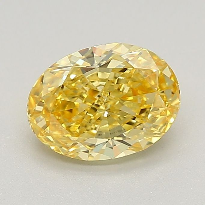Loose Diamond - OVAL 0.91ct Fancy Vivid Yellow VVS2: Loose Diamond - OVAL 0.91ct Fancy Vivid Yellow VVS2 Source: This is a real non-mined Diamond that has been grown in a lab Shape: OVAL Carats: 0.91 Color: Fancy Vivid Yellow Certification: IGI Video: