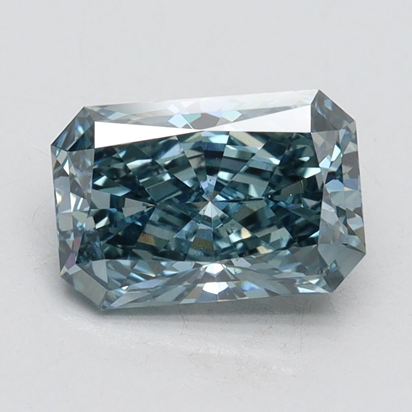 Loose Diamond - RADIANT 1.56ct Fancy Vivid Blue VS2: Loose Diamond - RADIANT 1.56ct Fancy Vivid Blue VS2 Source: This is a real non-mined Diamond that has been grown in a lab Shape: RADIANT Carats: 1.56 Color: Fancy Vivid Blue Certification: IGI Video: