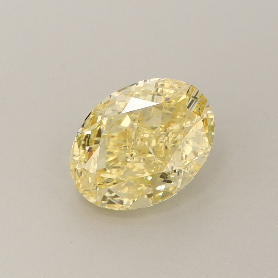 Loose Diamond - OVAL 1.26ct Fancy Vivid Yellow VS1: Loose Diamond - OVAL 1.26ct Fancy Vivid Yellow VS1 Source: This is a real non-mined Diamond that has been grown in a lab Shape: OVAL Carats: 1.26 Color: Fancy Vivid Yellow Certification: IGI Video: