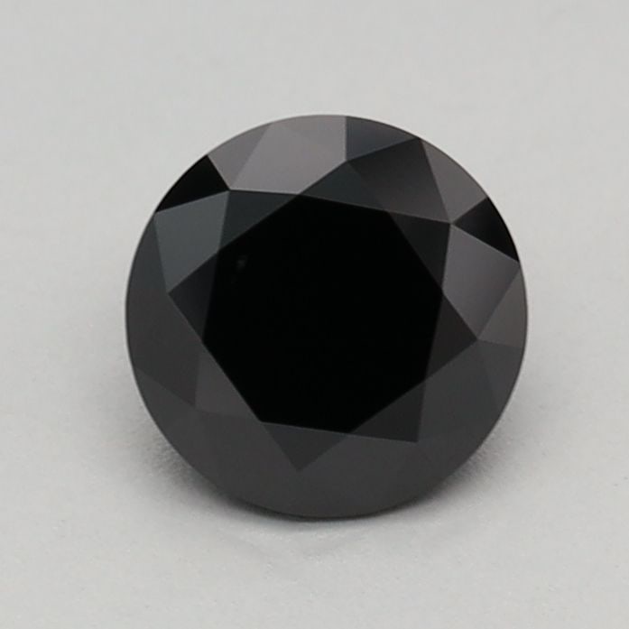 Loose Diamond - ROUND 0.58ct Fancy Black: Loose Diamond - ROUND 0.58ct Fancy Black Source: This is a real non-mined Diamond that has been grown in a lab Shape: ROUND Carats: 0.58 Color: Fancy Black Certification: IGI Video: