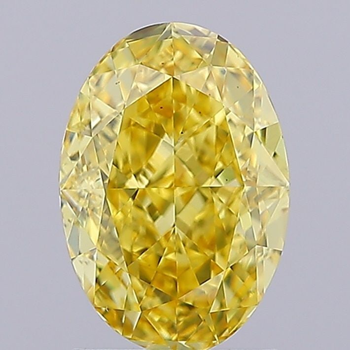 Loose Diamond - OVAL 2.12ct Fancy Vivid Yellow VS2: Loose Diamond - OVAL 2.12ct Fancy Vivid Yellow VS2 Source: This is a real non-mined Diamond that has been grown in a lab Shape: OVAL Carats: 2.12 Color: Fancy Vivid Yellow Certification: IGI Video: