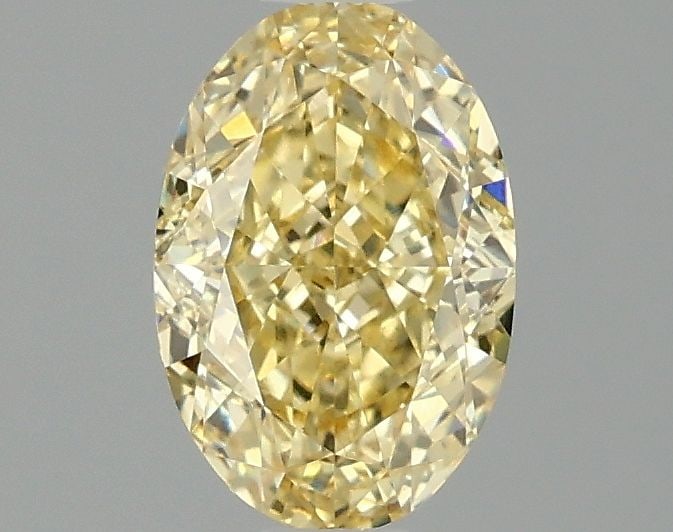 Loose Diamond - OVAL 1.04ct Fancy Vivid Yellow VS1: Loose Diamond - OVAL 1.04ct Fancy Vivid Yellow VS1 Source: This is a real non-mined Diamond that has been grown in a lab Shape: OVAL Carats: 1.04 Color: Fancy Vivid Yellow Certification: IGI Video: