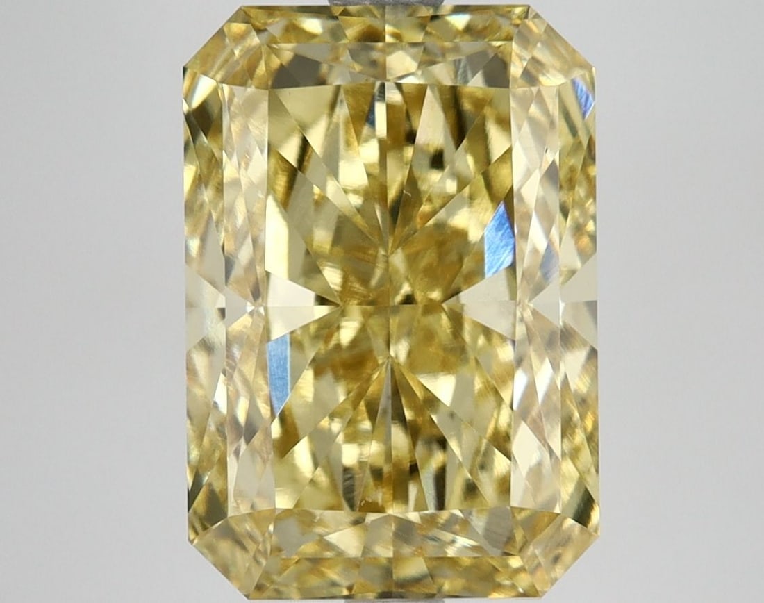 Loose Diamond - RADIANT 5.56ct Fancy Vivid Yellow VS1: Loose Diamond - RADIANT 5.56ct Fancy Vivid Yellow VS1 Source: This is a real non-mined Diamond that has been grown in a lab Shape: RADIANT Carats: 5.56 Color: Fancy Vivid Yellow Certification: IGI