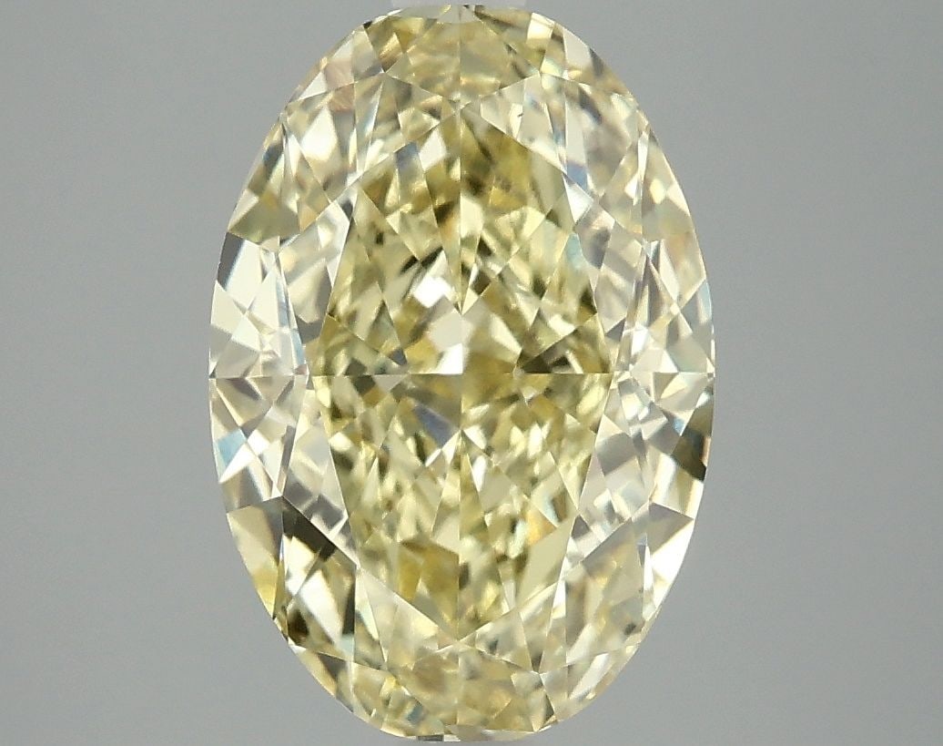 Loose Diamond - OVAL 4.09ct Fancy Intense Yellow VS1: Loose Diamond - OVAL 4.09ct Fancy Intense Yellow VS1 Source: This is a real non-mined Diamond that has been grown in a lab Shape: OVAL Carats: 4.09 Color: Fancy Intense Yellow Certification: IGI Video