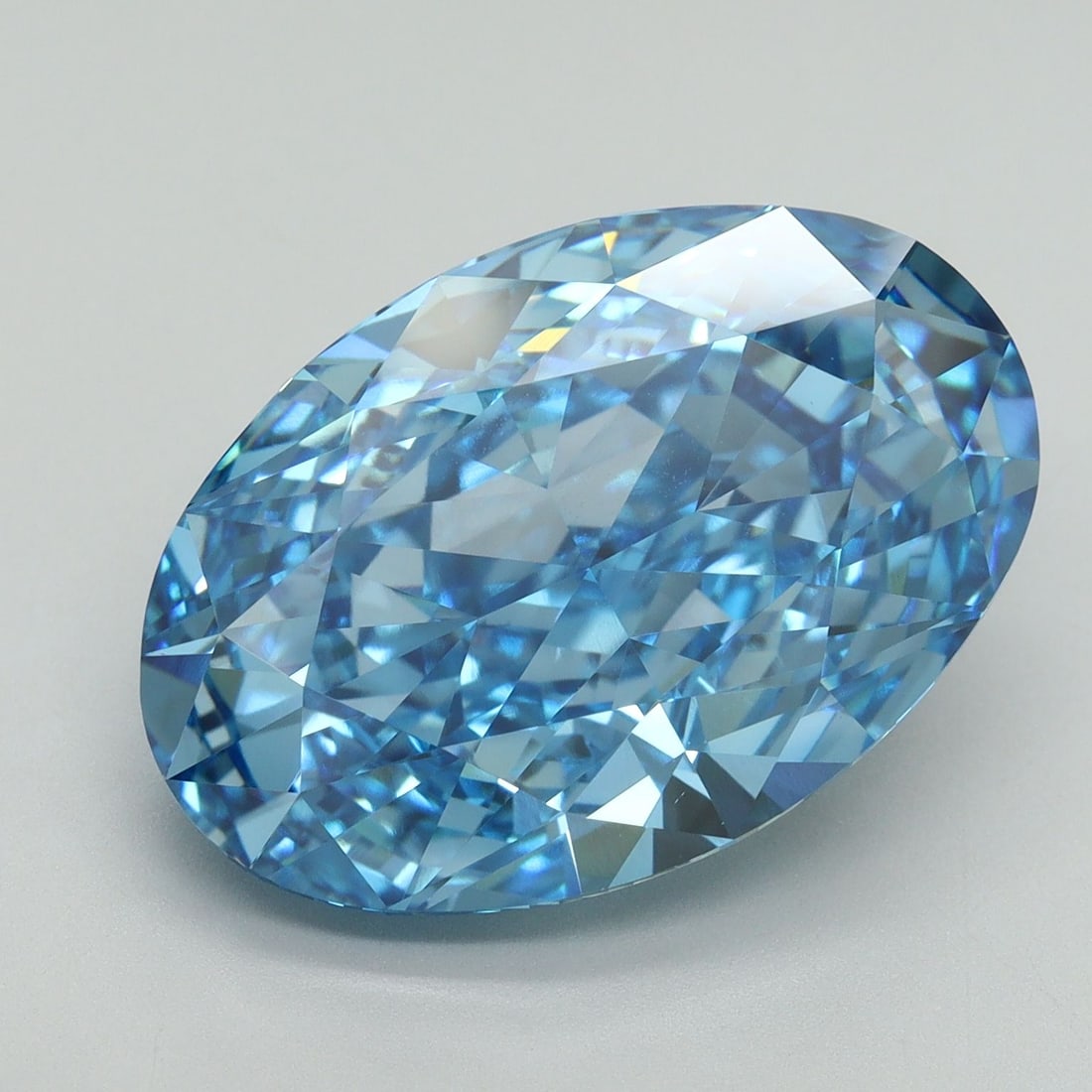 Loose Diamond - OVAL 11.59ct Fancy Vivid Blue VS1: Loose Diamond - OVAL 11.59ct Fancy Vivid Blue VS1 Source: This is a real non-mined Diamond that has been grown in a lab Shape: OVAL Carats: 11.59 Color: Fancy Vivid Blue Certification: IGI Video: