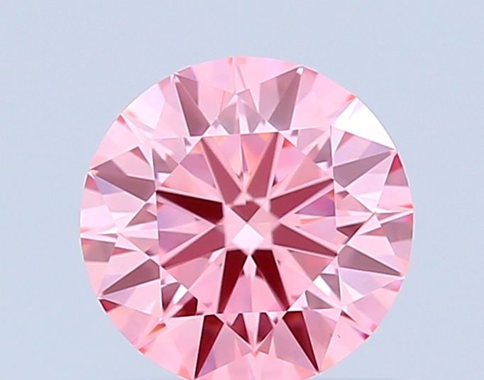 Ideal Loose Diamond - ROUND 0.52ct Fancy Vivid Pink VVS2: Ideal Loose Diamond - ROUND 0.52ct Fancy Vivid Pink VVS2 Source: This is a real non-mined Diamond that has been grown in a lab Shape: ROUND Carats: 0.52 Color: Fancy Vivid Pink Certification: IGI Vide