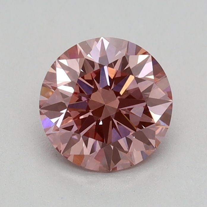 Ideal Loose Diamond - ROUND 0.57ct Fancy Vivid Pink VS1: Ideal Loose Diamond - ROUND 0.57ct Fancy Vivid Pink VS1 Source: This is a real non-mined Diamond that has been grown in a lab Shape: ROUND Carats: 0.57 Color: Fancy Vivid Pink Certification: IGI Video