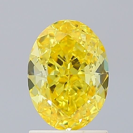 Loose Diamond - OVAL 1.7ct Fancy Vivid Yellow VVS2: Loose Diamond - OVAL 1.7ct Fancy Vivid Yellow VVS2 Source: This is a real non-mined Diamond that has been grown in a lab Shape: OVAL Carats: 1.7 Color: Fancy Vivid Yellow Certification: IGI Video: