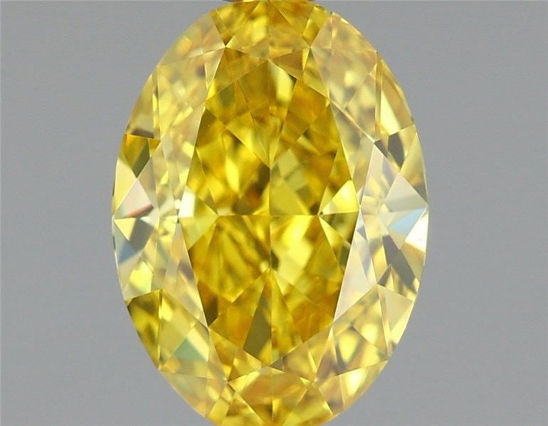 Loose Diamond - OVAL 1.26ct Fancy Vivid Yellow VS1: Loose Diamond - OVAL 1.26ct Fancy Vivid Yellow VS1 Source: This is a real non-mined Diamond that has been grown in a lab Shape: OVAL Carats: 1.26 Color: Fancy Vivid Yellow Certification: IGI Video: