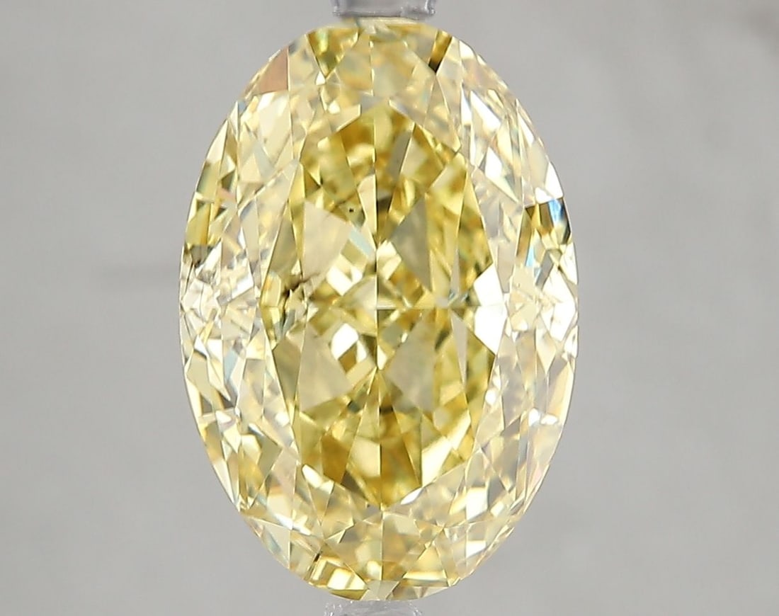 Loose Diamond - OVAL 5.03ct Fancy Intense Yellow VS2: Loose Diamond - OVAL 5.03ct Fancy Intense Yellow VS2 Source: This is a real non-mined Diamond that has been grown in a lab Shape: OVAL Carats: 5.03 Color: Fancy Intense Yellow Certification: IGI Video
