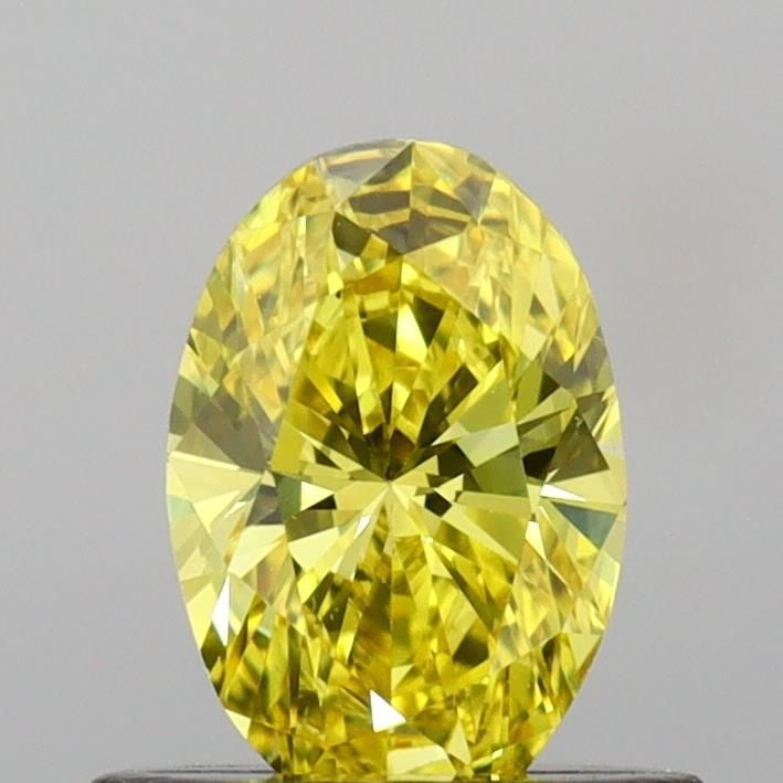 Loose Diamond - OVAL 0.56ct Fancy Vivid Yellow VS1: Loose Diamond - OVAL 0.56ct Fancy Vivid Yellow VS1 Source: This is a real non-mined Diamond that has been grown in a lab Shape: OVAL Carats: 0.56 Color: Fancy Vivid Yellow Certification: IGI Video: