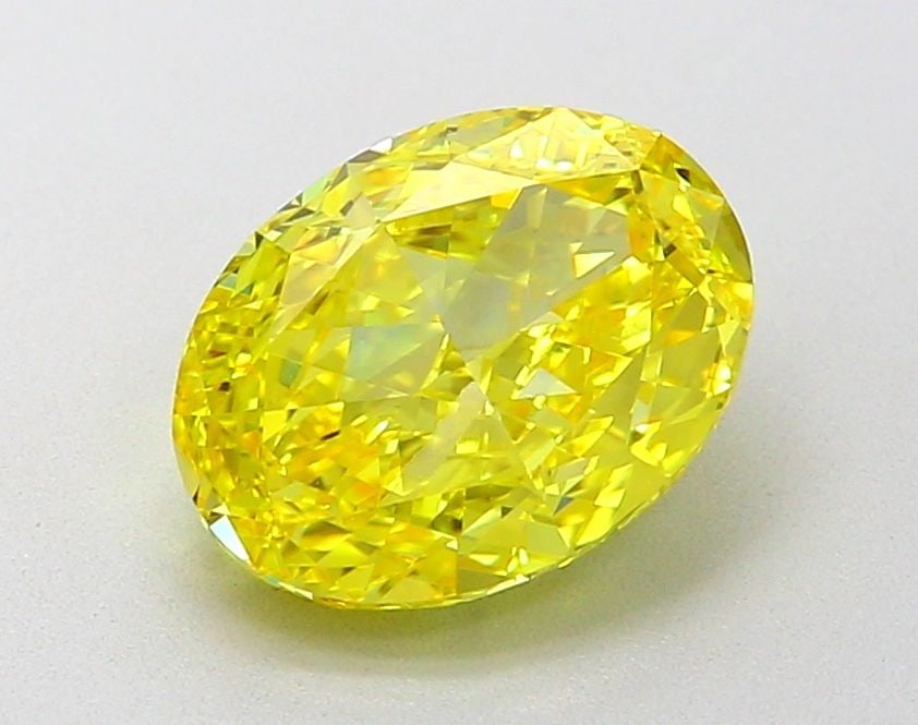Loose Diamond - OVAL 2.02ct Fancy Vivid Yellow VVS2: Loose Diamond - OVAL 2.02ct Fancy Vivid Yellow VVS2 Source: This is a real non-mined Diamond that has been grown in a lab Shape: OVAL Carats: 2.02 Color: Fancy Vivid Yellow Certification: IGI Video: