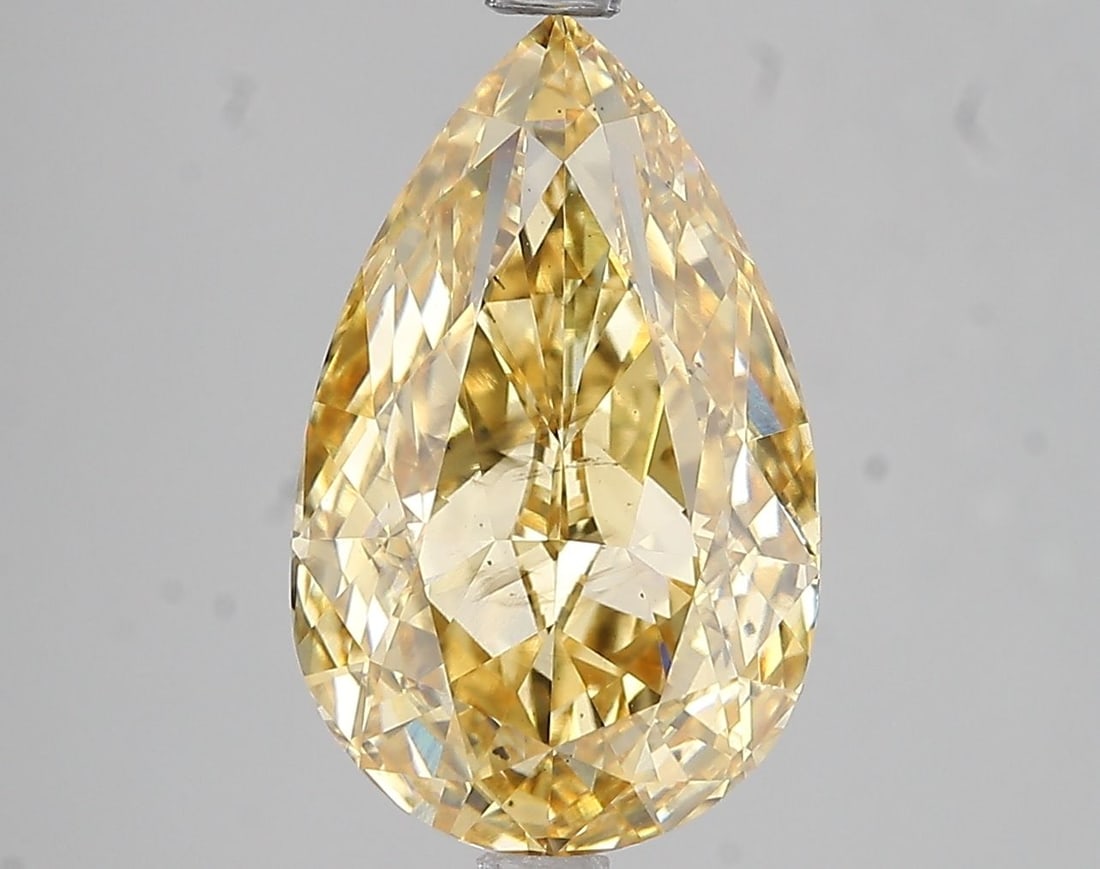 Loose Diamond - PEAR 5.03ct Fancy Intense Yellow SI1: Loose Diamond - PEAR 5.03ct Fancy Intense Yellow SI1 Source: This is a real non-mined Diamond that has been grown in a lab Shape: PEAR Carats: 5.03 Color: Fancy Intense Yellow Certification: IGI
