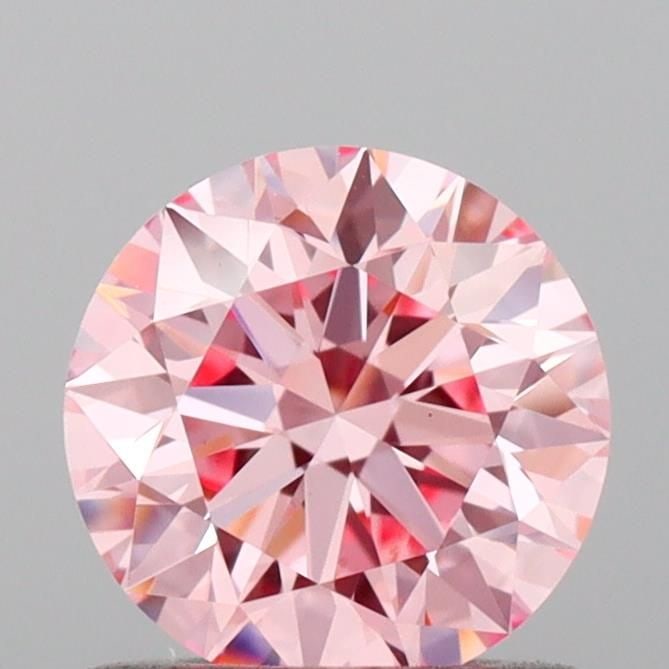 Ideal Loose Diamond - ROUND 0.76ct Fancy Vivid Pink VS1: Ideal Loose Diamond - ROUND 0.76ct Fancy Vivid Pink VS1 Source: This is a real non-mined Diamond that has been grown in a lab Shape: ROUND Carats: 0.76 Color: Fancy Vivid Pink Certification: IGI Video