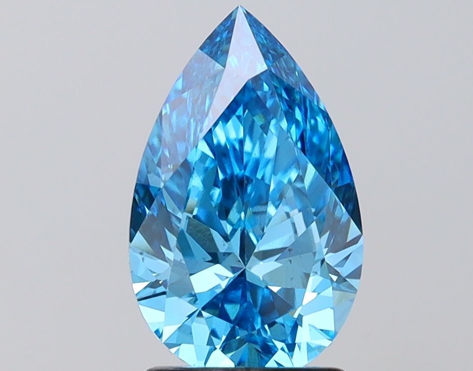 Loose Diamond - PEAR 1.96ct Fancy Vivid Blue VS2: Loose Diamond - PEAR 1.96ct Fancy Vivid Blue VS2 Source: This is a real non-mined Diamond that has been grown in a lab Shape: PEAR Carats: 1.96 Color: Fancy Vivid Blue Certification: IGI Video: