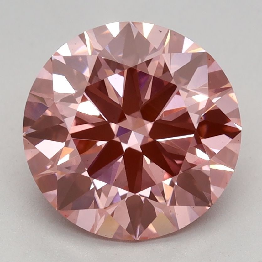 Ideal Loose Diamond - ROUND 2.03ct Fancy Vivid Pink VS2: Ideal Loose Diamond - ROUND 2.03ct Fancy Vivid Pink VS2 Source: This is a real non-mined Diamond that has been grown in a lab Shape: ROUND Carats: 2.03 Color: Fancy Vivid Pink Certification: IGI