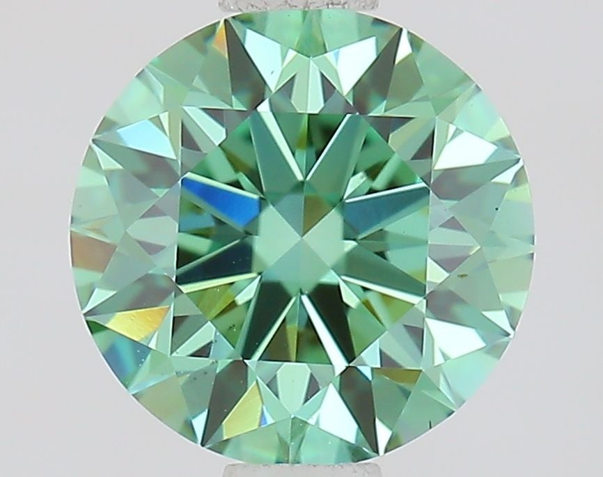 Ideal Loose Diamond - ROUND 1.03ct Fancy Vivid Green VS1: Ideal Loose Diamond - ROUND 1.03ct Fancy Vivid Green VS1 Source: This is a real non-mined Diamond that has been grown in a lab Shape: ROUND Carats: 1.03 Color: Fancy Vivid Green Certification: IGI