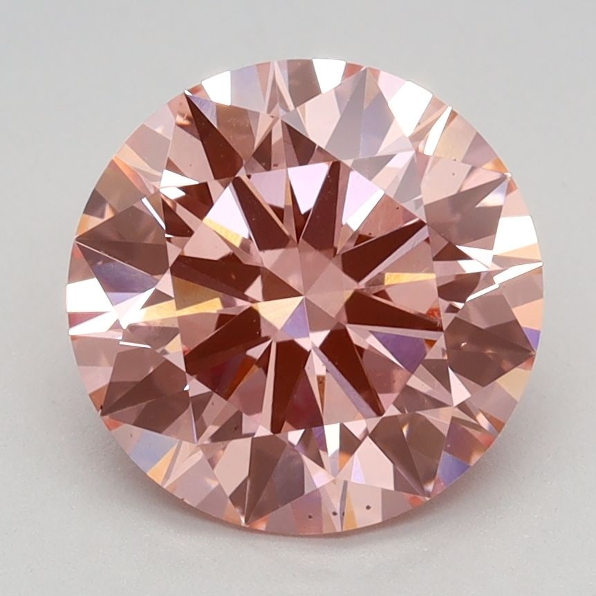 Ideal Loose Diamond - ROUND 2.37ct Fancy Vivid Pink VS2: Ideal Loose Diamond - ROUND 2.37ct Fancy Vivid Pink VS2 Source: This is a real non-mined Diamond that has been grown in a lab Shape: ROUND Carats: 2.37 Color: Fancy Vivid Pink Certification: IGI Video
