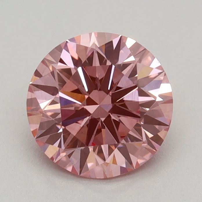 Ideal Loose Diamond - ROUND 0.59ct Fancy Vivid Pink VS1: Ideal Loose Diamond - ROUND 0.59ct Fancy Vivid Pink VS1 Source: This is a real non-mined Diamond that has been grown in a lab Shape: ROUND Carats: 0.59 Color: Fancy Vivid Pink Certification: IGI Video