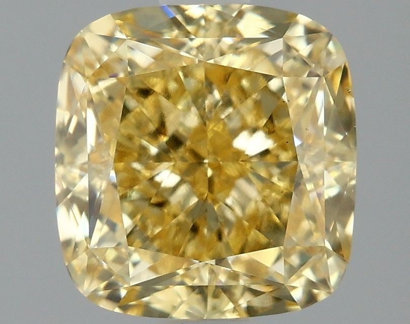 Loose Diamond - CUSHION MODIFIED 2.03ct Fancy Vivid Yellow VS2: Loose Diamond - CUSHION MODIFIED 2.03ct Fancy Vivid Yellow VS2 Source: This is a real non-mined Diamond that has been grown in a lab Shape: CUSHION MODIFIED Carats: 2.03 Color: Fancy Vivid Yellow Cert