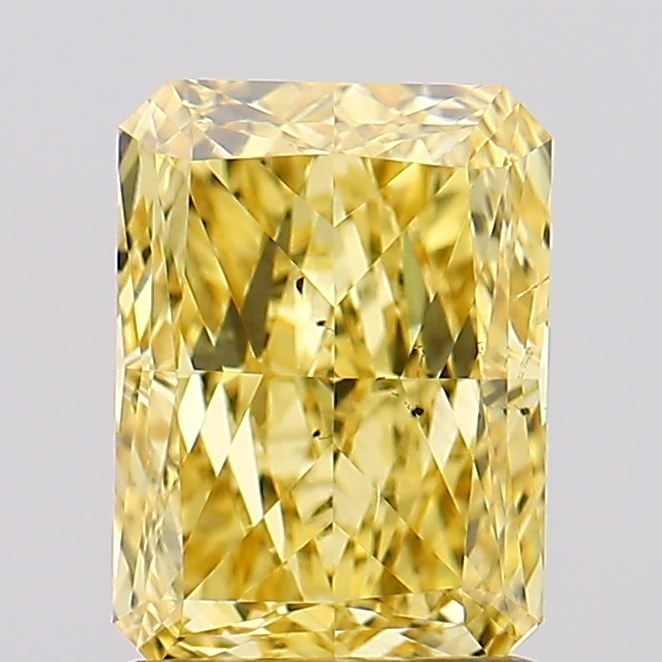 Loose Diamond - RADIANT 1.52ct Fancy Vivid Yellow SI1: Loose Diamond - RADIANT 1.52ct Fancy Vivid Yellow SI1 Source: This is a real non-mined Diamond that has been grown in a lab Shape: RADIANT Carats: 1.52 Color: Fancy Vivid Yellow Certification: IGI Vid