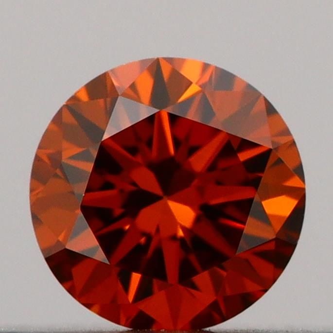 Loose Diamond - ROUND 0.18ct Fancy Deep Orange VVS2: Loose Diamond - ROUND 0.18ct Fancy Deep Orange VVS2 Source: This is a real non-mined Diamond that has been grown in a lab Shape: ROUND Carats: 0.18 Color: Fancy Deep Orange Certification: IGI Video: