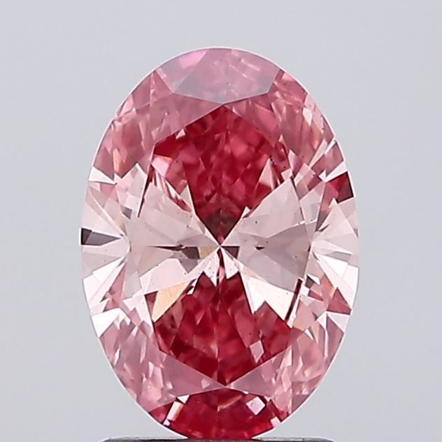 Loose Diamond - OVAL 1.63ct Fancy Vivid Pink VS2: Loose Diamond - OVAL 1.63ct Fancy Vivid Pink VS2 Source: This is a real non-mined Diamond that has been grown in a lab Shape: OVAL Carats: 1.63 Color: Fancy Vivid Pink Certification: IGI Video: