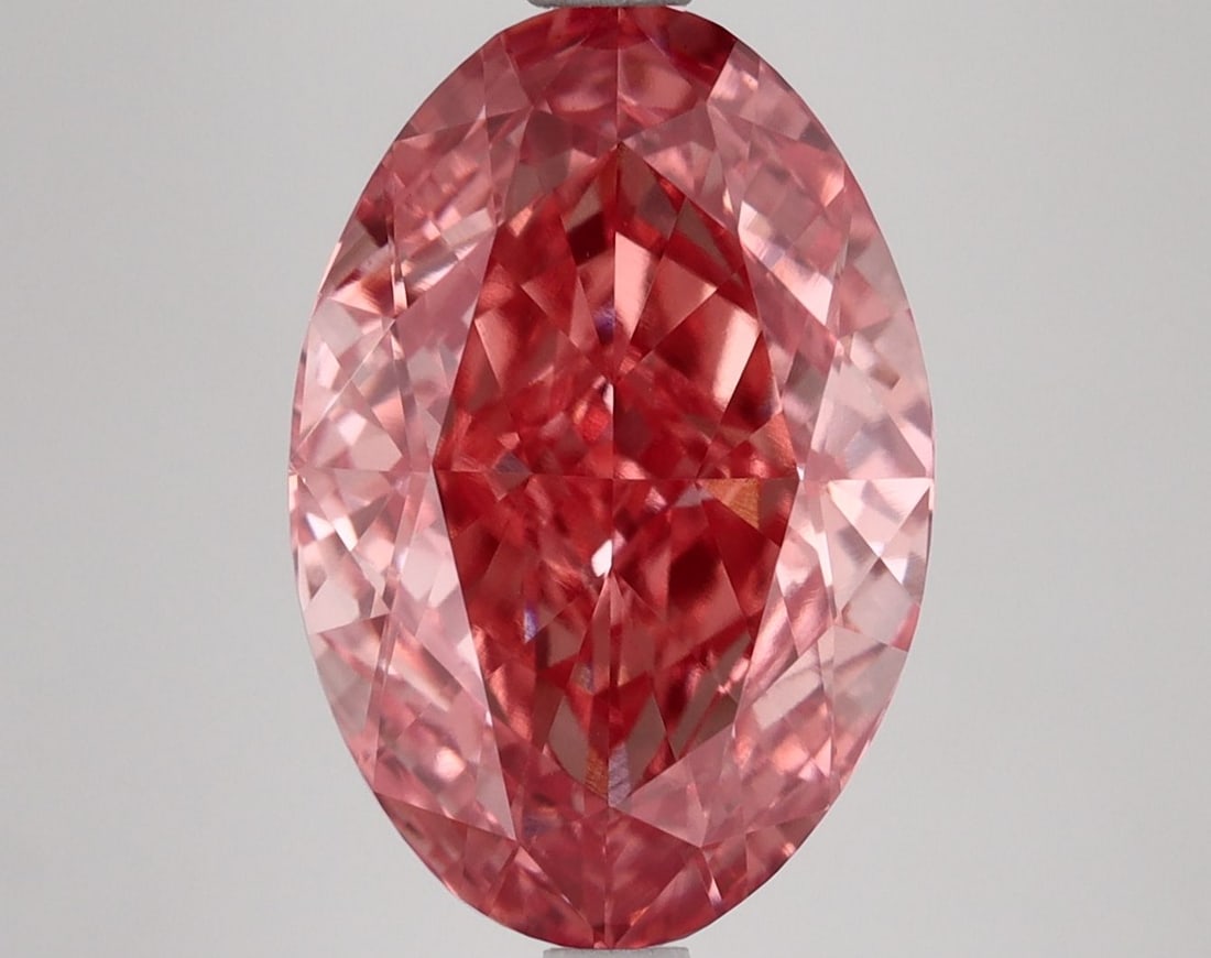 Loose Diamond - OVAL 5.61ct Fancy Vivid Pink VVS2: Loose Diamond - OVAL 5.61ct Fancy Vivid Pink VVS2 Source: This is a real non-mined Diamond that has been grown in a lab Shape: OVAL Carats: 5.61 Color: Fancy Vivid Pink Certification: IGI Video: