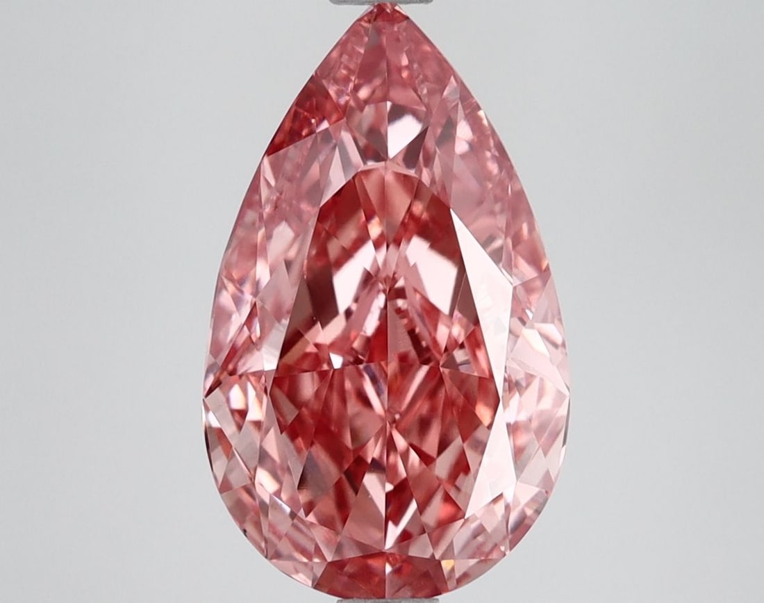 Loose Diamond - PEAR 3.13ct Fancy Vivid Pink VS1: Loose Diamond - PEAR 3.13ct Fancy Vivid Pink VS1 Source: This is a real non-mined Diamond that has been grown in a lab Shape: PEAR Carats: 3.13 Color: Fancy Vivid Pink Certification: IGI Video: