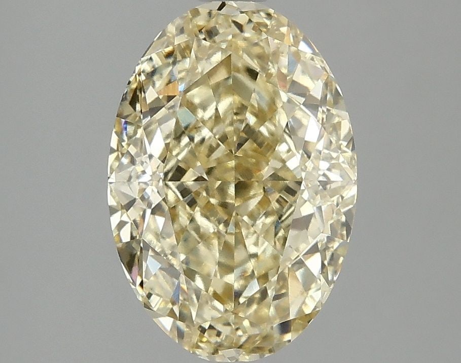 Loose Diamond - OVAL 3.09ct Fancy Intense Yellow VS1: Loose Diamond - OVAL 3.09ct Fancy Intense Yellow VS1 Source: This is a real non-mined Diamond that has been grown in a lab Shape: OVAL Carats: 3.09 Color: Fancy Intense Yellow Certification: IGI Video