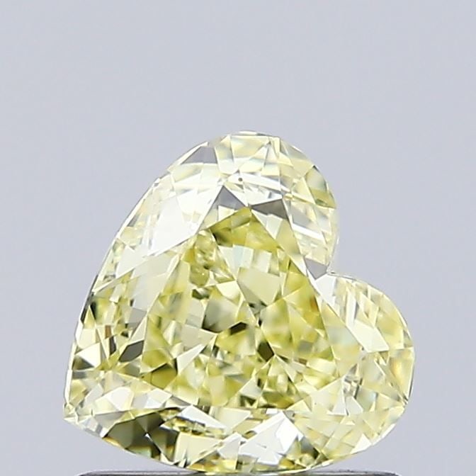 Loose Diamond - HEART 0.94ct Fancy Intense Yellow VS1: Loose Diamond - HEART 0.94ct Fancy Intense Yellow VS1 Source: This is a real non-mined Diamond that has been grown in a lab Shape: HEART Carats: 0.94 Color: Fancy Intense Yellow Certification: IGI Vid