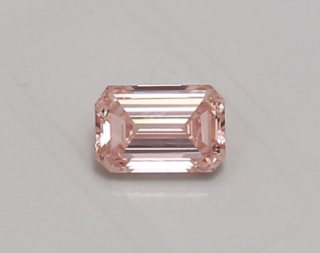 Loose Diamond - EMERALD 0.43ct Fancy Vivid Pink VVS2: Loose Diamond - EMERALD 0.43ct Fancy Vivid Pink VVS2 Source: This is a real non-mined Diamond that has been grown in a lab Shape: EMERALD Carats: 0.43 Color: Fancy Vivid Pink Certification: IGI Video: