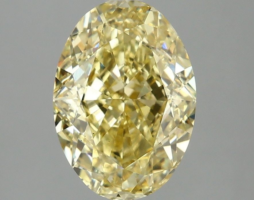 Loose Diamond - OVAL 3.05ct Fancy Intense Yellow VS2: Loose Diamond - OVAL 3.05ct Fancy Intense Yellow VS2 Source: This is a real non-mined Diamond that has been grown in a lab Shape: OVAL Carats: 3.05 Color: Fancy Intense Yellow Certification: IGI Video