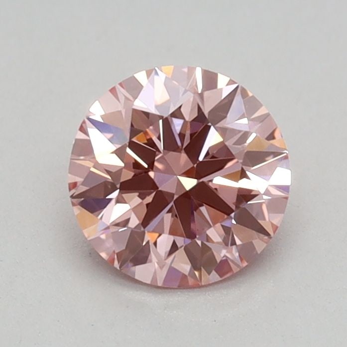 Ideal Loose Diamond - ROUND 0.55ct Fancy Vivid Pink VVS2: Ideal Loose Diamond - ROUND 0.55ct Fancy Vivid Pink VVS2 Source: This is a real non-mined Diamond that has been grown in a lab Shape: ROUND Carats: 0.55 Color: Fancy Vivid Pink Certification: IGI Vide