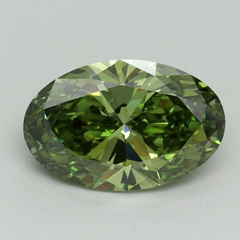 Loose Diamond - OVAL 1.07ct Fancy Vivid Green VS2: Loose Diamond - OVAL 1.07ct Fancy Vivid Green VS2 Source: This is a real non-mined Diamond that has been grown in a lab Shape: OVAL Carats: 1.07 Color: Fancy Vivid Green Certification: IGI Video: