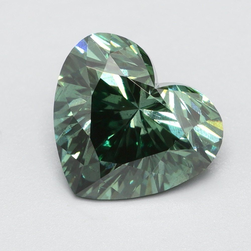 Loose Diamond - HEART 1.15ct Fancy Vivid Blue SI1: Loose Diamond - HEART 1.15ct Fancy Vivid Blue SI1 Source: This is a real non-mined Diamond that has been grown in a lab Shape: HEART Carats: 1.15 Color: Fancy Vivid Blue Certification: NONE Video: