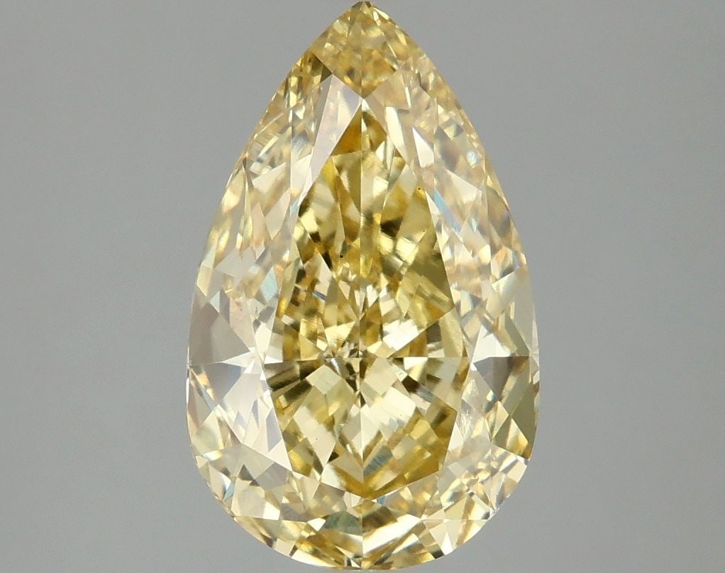 Loose Diamond - PEAR 3.1ct Fancy Intense Yellow VS1: Loose Diamond - PEAR 3.1ct Fancy Intense Yellow VS1 Source: This is a real non-mined Diamond that has been grown in a lab Shape: PEAR Carats: 3.1 Color: Fancy Intense Yellow Certification: IGI Video: