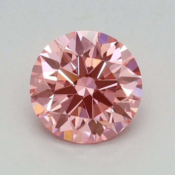 Ideal Loose Diamond - ROUND 0.56ct Fancy Vivid Pink VVS2: Ideal Loose Diamond - ROUND 0.56ct Fancy Vivid Pink VVS2 Source: This is a real non-mined Diamond that has been grown in a lab Shape: ROUND Carats: 0.56 Color: Fancy Vivid Pink Certification: IGI Vide
