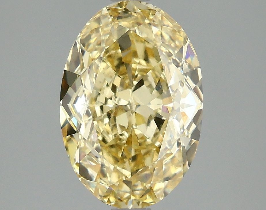 Loose Diamond - OVAL 3.01ct Fancy Intense Yellow VS1: Loose Diamond - OVAL 3.01ct Fancy Intense Yellow VS1 Source: This is a real non-mined Diamond that has been grown in a lab Shape: OVAL Carats: 3.01 Color: Fancy Intense Yellow Certification: IGI Video