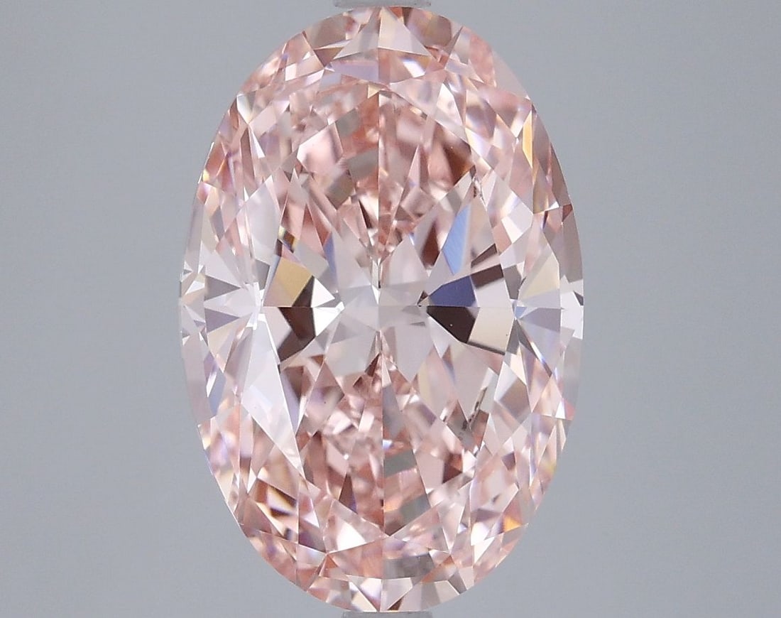 Loose Diamond - OVAL 5.05ct Fancy Vivid Pink VVS2: Loose Diamond - OVAL 5.05ct Fancy Vivid Pink VVS2 Source: This is a real non-mined Diamond that has been grown in a lab Shape: OVAL Carats: 5.05 Color: Fancy Vivid Pink Certification: IGI Video: