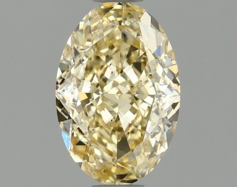 Loose Diamond - OVAL 1.07ct Fancy Intense Yellow VS2: Loose Diamond - OVAL 1.07ct Fancy Intense Yellow VS2 Source: This is a real non-mined Diamond that has been grown in a lab Shape: OVAL Carats: 1.07 Color: Fancy Intense Yellow Certification: IGI Video